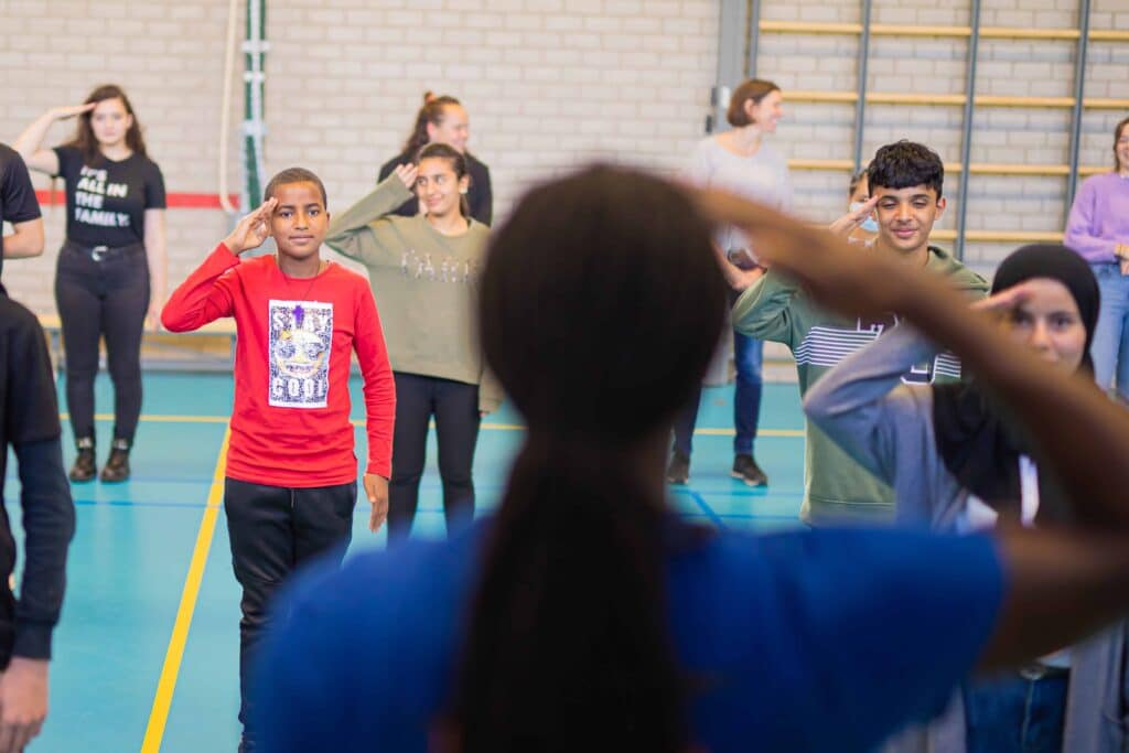 6L6A5053 291 Jongeren doen mee aan een dansworkshop in een gymzaal
